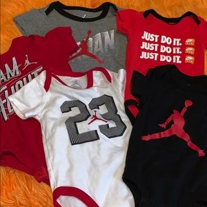 Lot of Jordan/Nike onesies